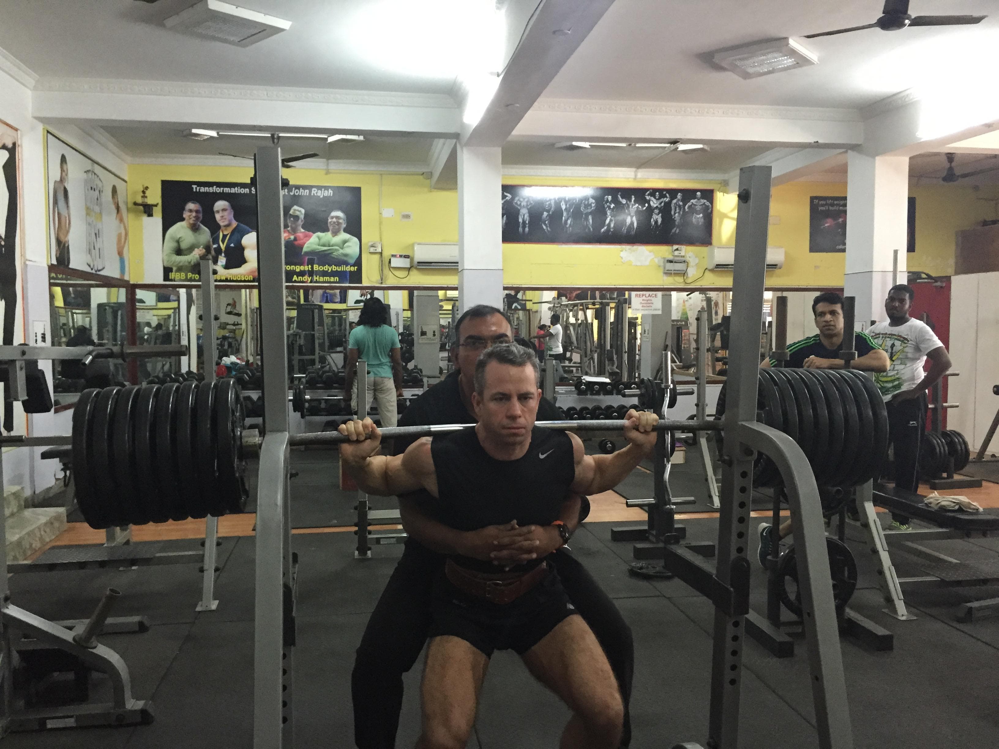 Mark with his coach in India in 2015, learning that coaching was about more than programs and meal plans.