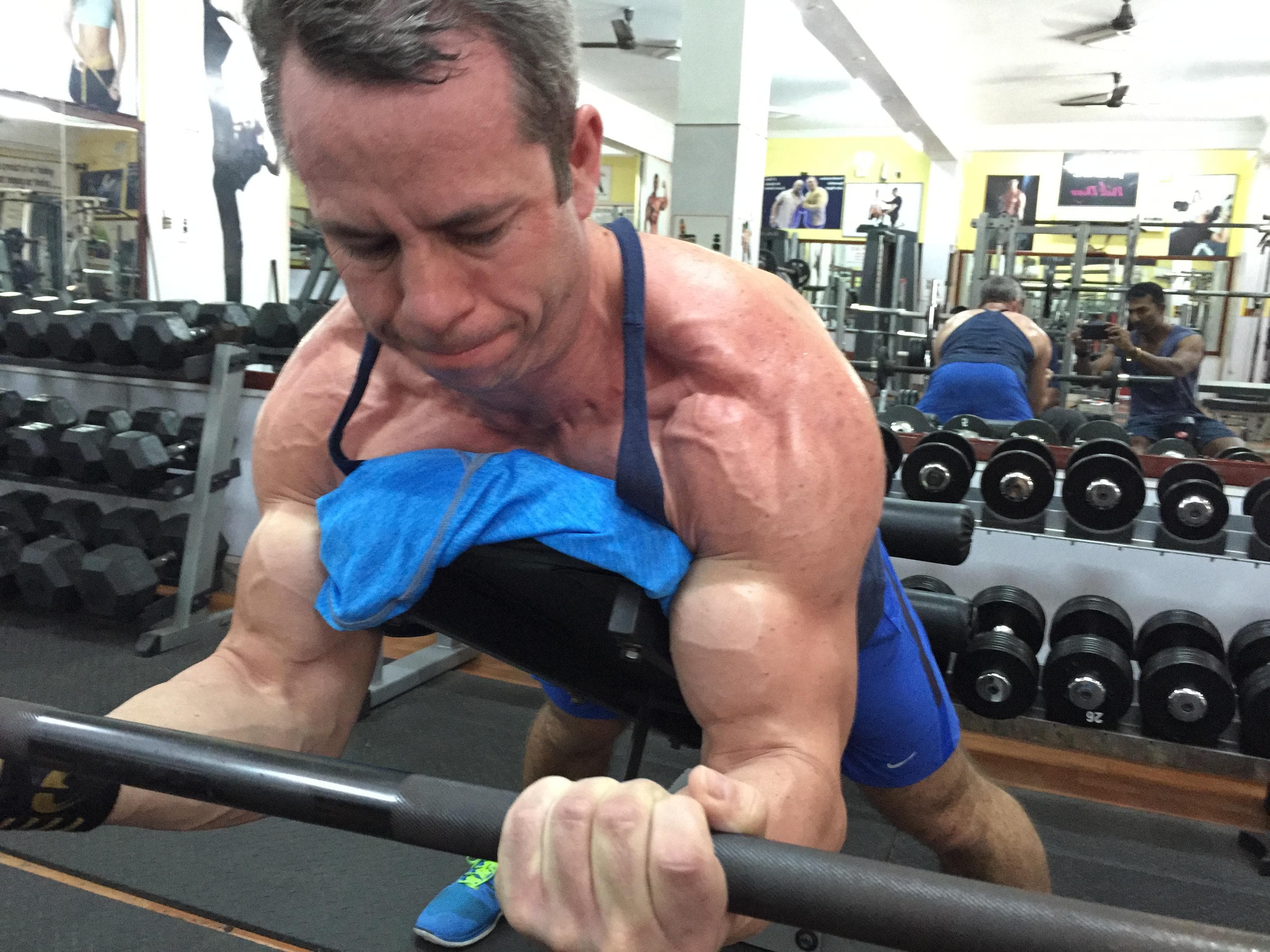 Mark training under his coach in India in 2015, learning the quiet discipline behind real progress.