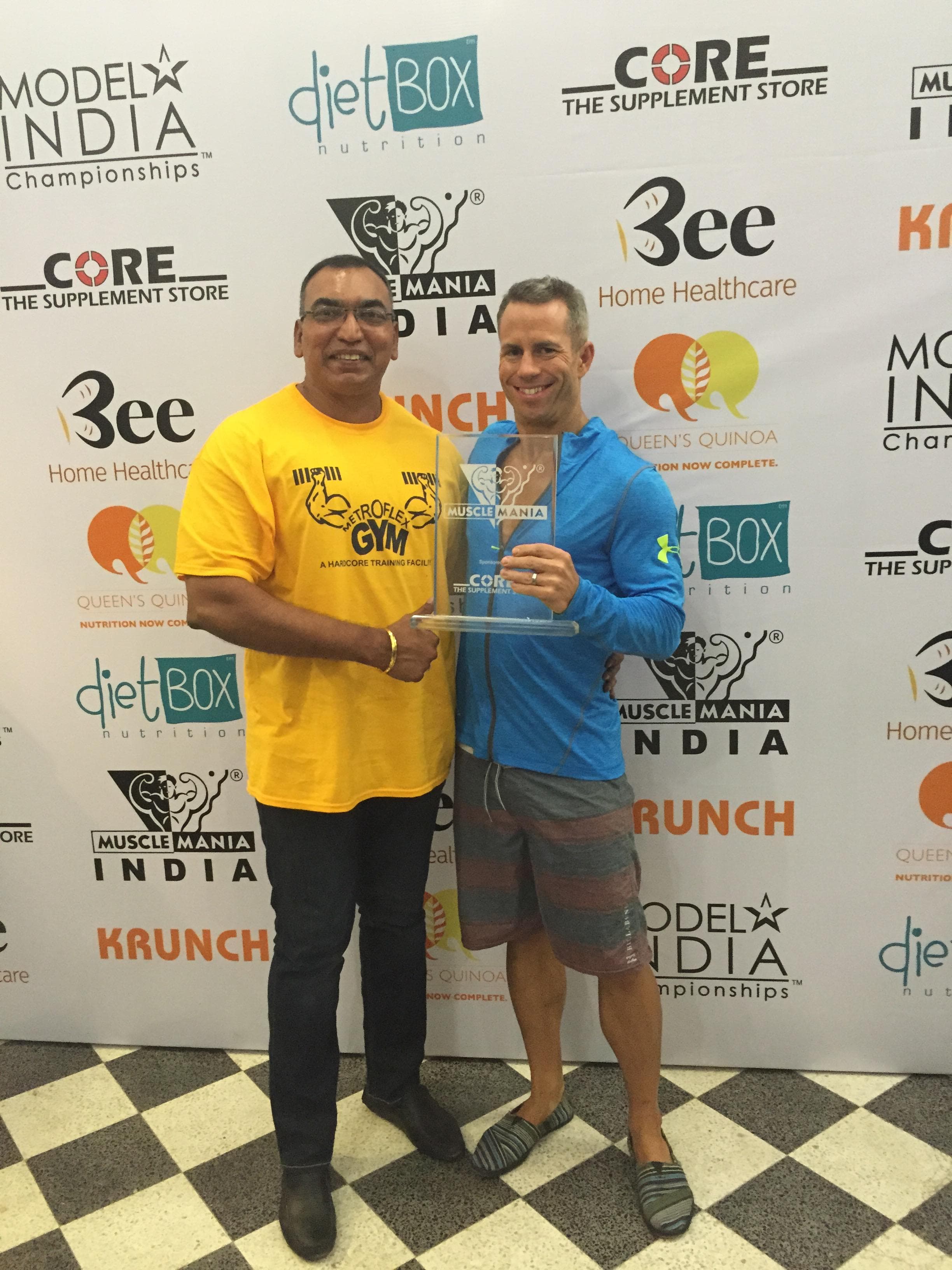Mark with his coach in India in September 2015, holding a trophy that meant less than the lessons learned.